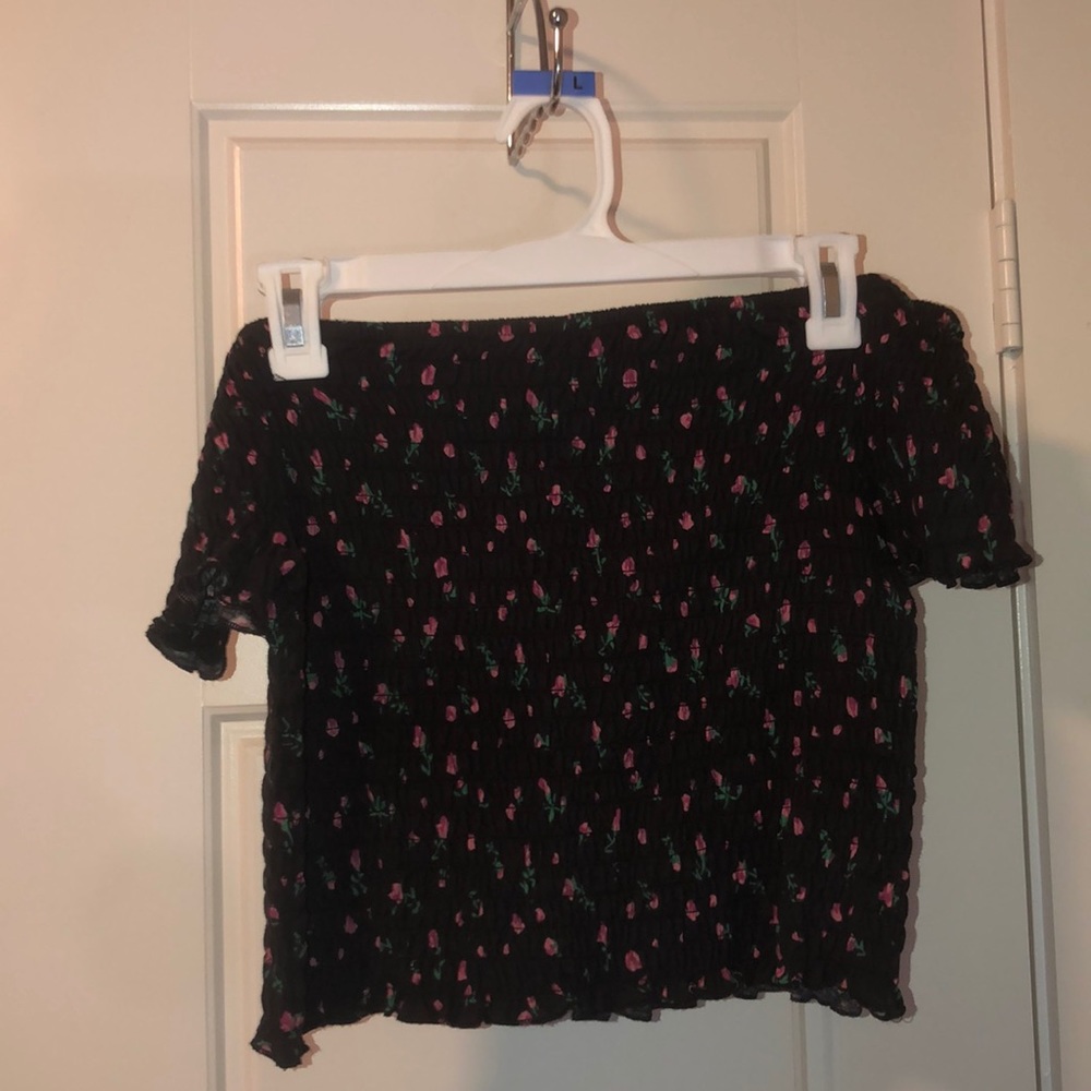 Large floral print off the shoulder shirt